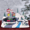 Villaggio Natalizio 243012 treno Natale con Luci Suoni e Movimento 24x16x17 cm
